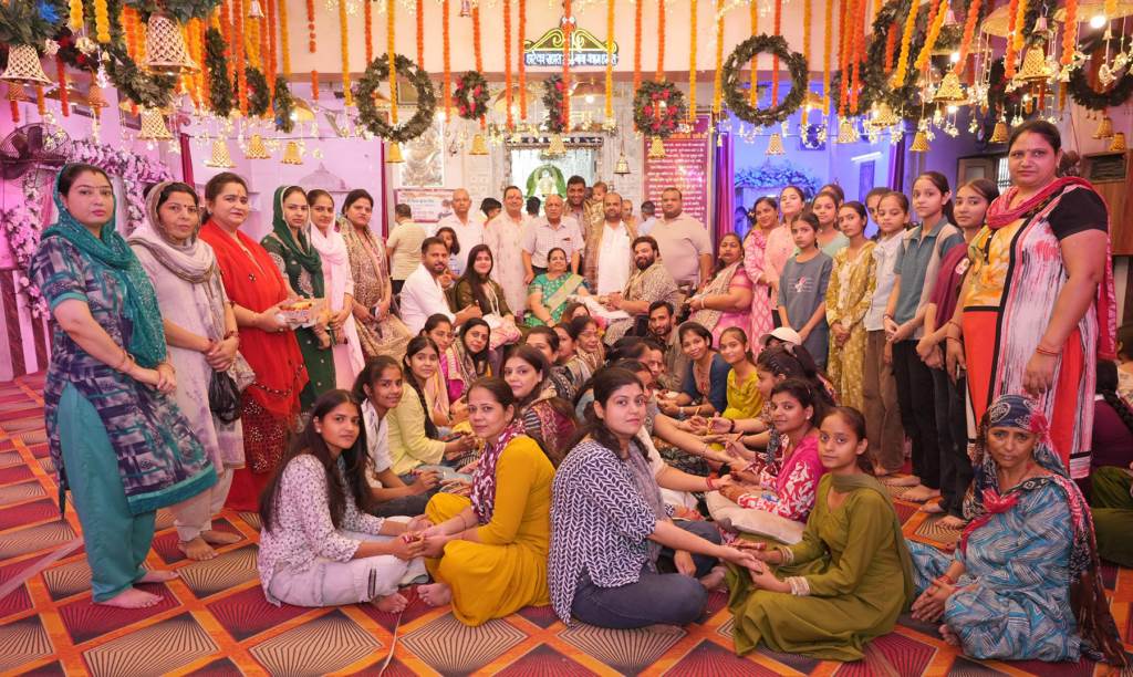 Women Adorn Hands with Shri Shyam Name Mehndi